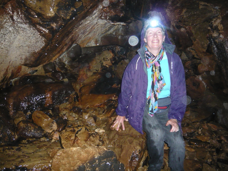 Sue exploring a cave